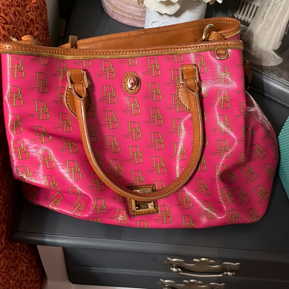 Dooney and Bourke satchel , dark pink , used in perfect condition.